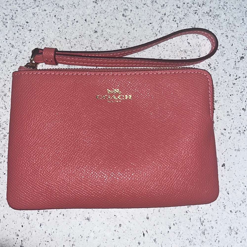 Pink coach wristlet